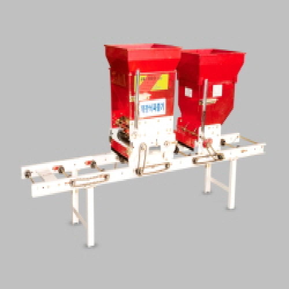 Manual chain roller type sower with scattering double container