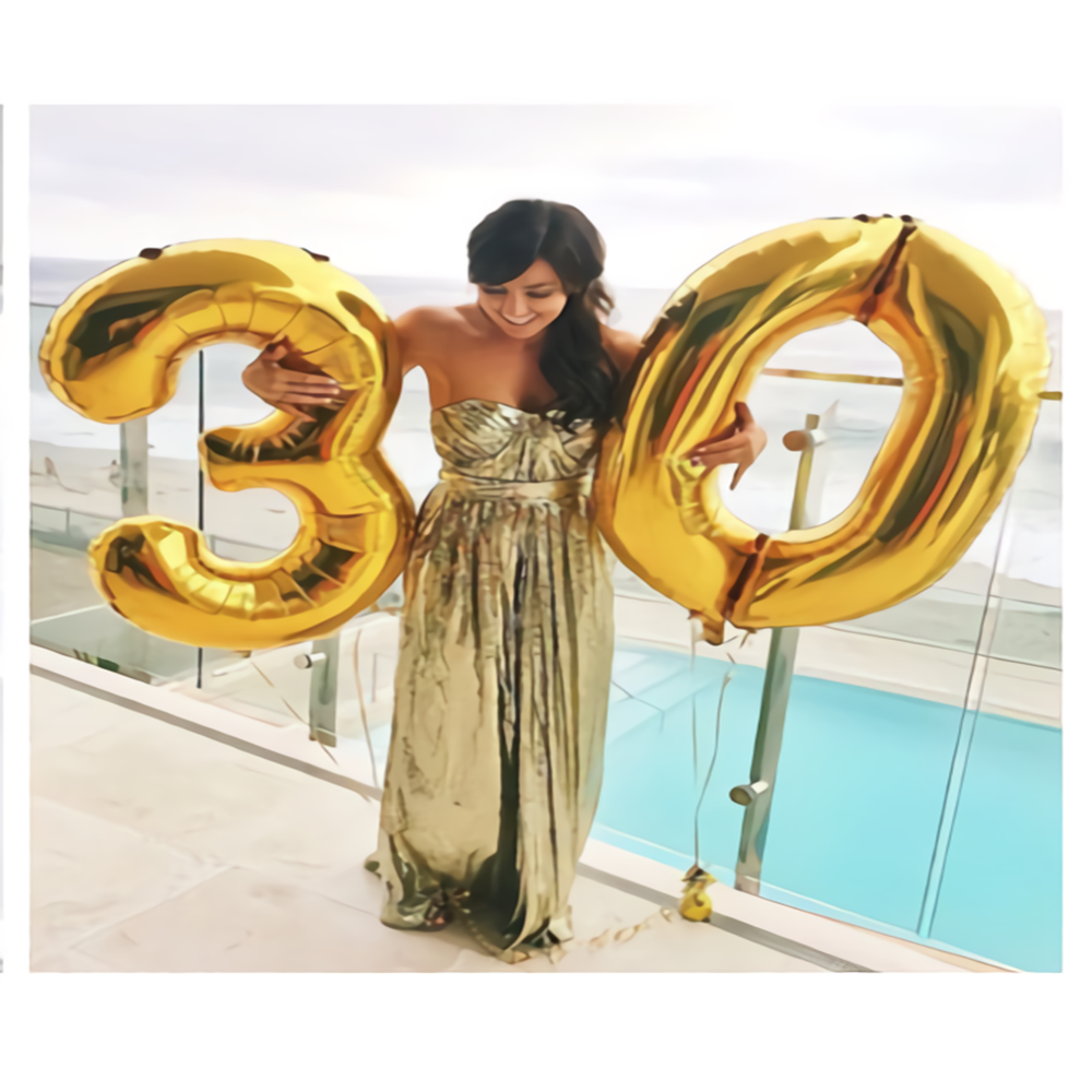 Balloon for an event and a birthday shaped numbers (gold)